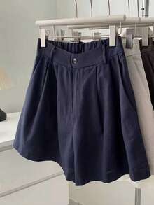 Quần short nữ dáng rộng, cài cúc, xếp ly, đa năng, thích hợp mặc đi làm vào mùa hè. - Màu xanh hải quân - Xem 4
