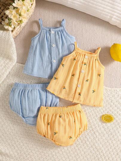 Bộ đồ đôi 2 mảnh màu hồng và mơ cho bé sơ sinh, kiểu dáng đơn giản phối họa tiết hoa nhí, gồm áo hai dây và quần đùi tam giác, thích hợp mặc thường ngày và chụp ảnh.