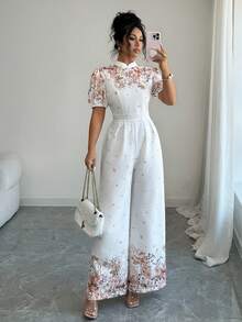 Elenzga Bộ jumpsuit nữ in hoa tay ngắn dáng cánh hoa ống rộng thanh lịch - trắng - Xem 7
