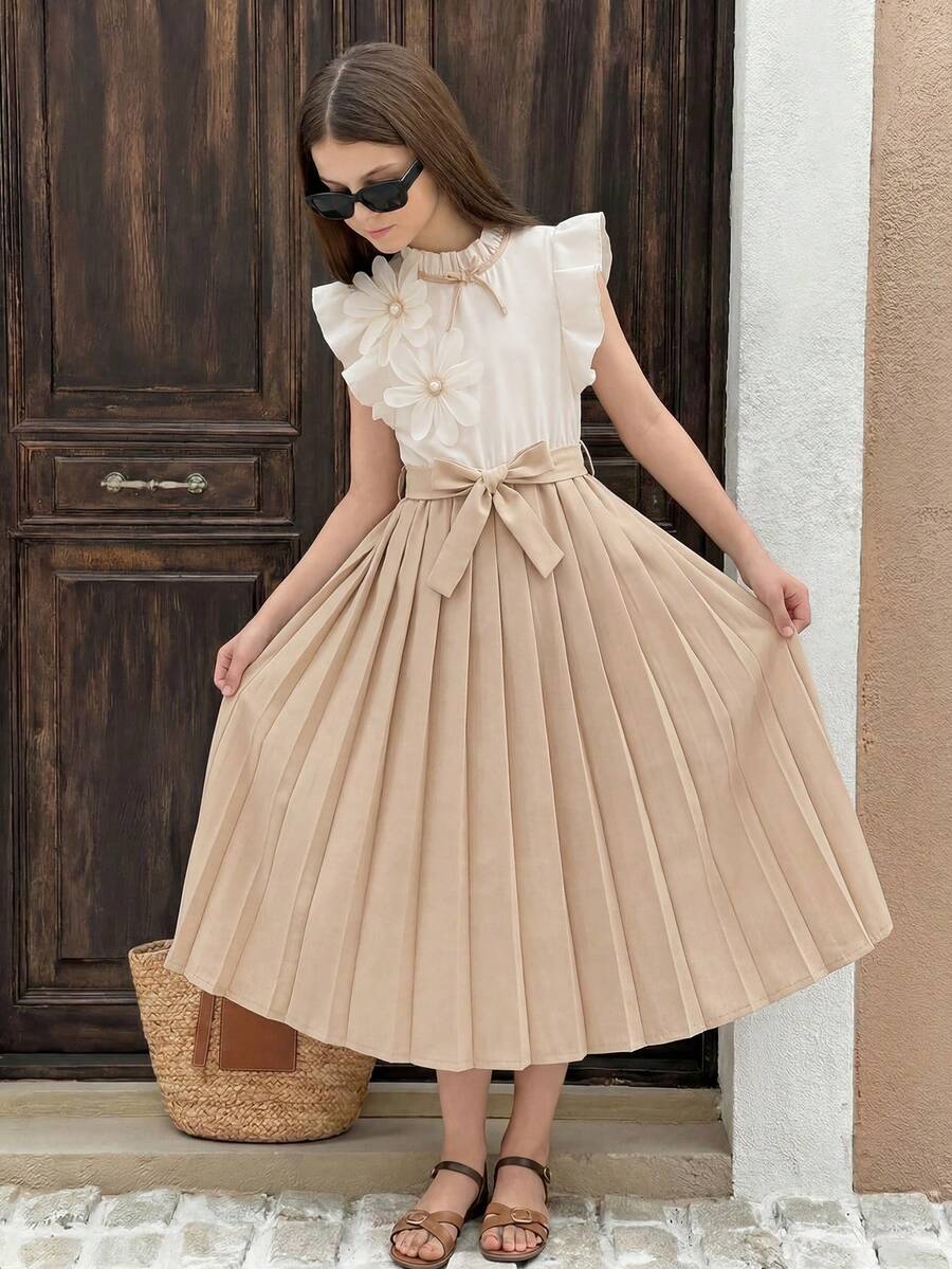 Đầm ngắn tay màu kaki thanh lịch, đa năng dành cho bé gái, thiết kế tay bồng, họa tiết hoa trên ngực và cổ áo nơ, kiểu dáng ngọt ngào và dễ thương, có thắt lưng giúp tôn dáng, phù hợp cho biểu diễn, tiệc tùng, giải trí và các dịp khác. - Màu Khaki - Xem 1