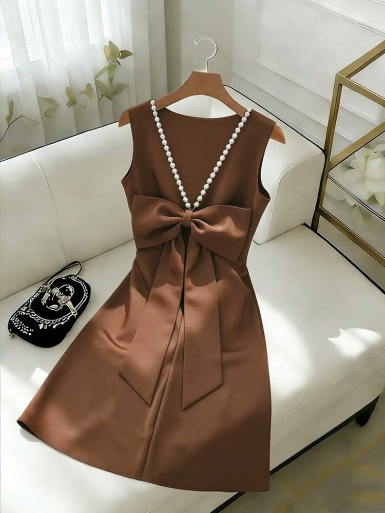 elegant beaded wedding dresses Ivory Strapless Beaded Bow Back Midi Dress