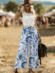 GlowEve 夏季新品：休闲裤、度假裤、佩斯利花纹和腰果花图案、蝴蝶结腰带、阔腿裤。女士蓝白印花裤、度假裤、夏季裤、休闲裤、阔腿裤 - 藍白色 - 查看 7