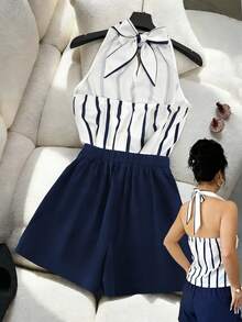 Airaco Top sin espalda con cuello de halter a rayas verticales azul y blanco + Pantalones cortos de pierna ancha azul marino, conjunto de 2 piezas para ir al trabajo - Azul Marino - Ver 2