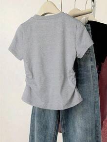 Áo thun bé gái tuổi teen họa tiết gấu thắt nút dễ thương, màu xám tro, thích hợp cho mùa xuân và hè, thoải mái và năng động, thuộc dòng sản phẩm mùa hè mát mẻ, cần thiết cho trẻ em mùa hè, đồ không thể thiếu khi trở lại trường, thời trang hè cho bé gái, phong cách cơ bản, phong cách Hàn Quốc mùa xuân hè. - Màu Xám nhạt - Xem 2