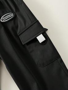 SHEIN Pantalones casuales de calle para niño con patrón de letras grises y cintura elástica - Negro - Ver 8