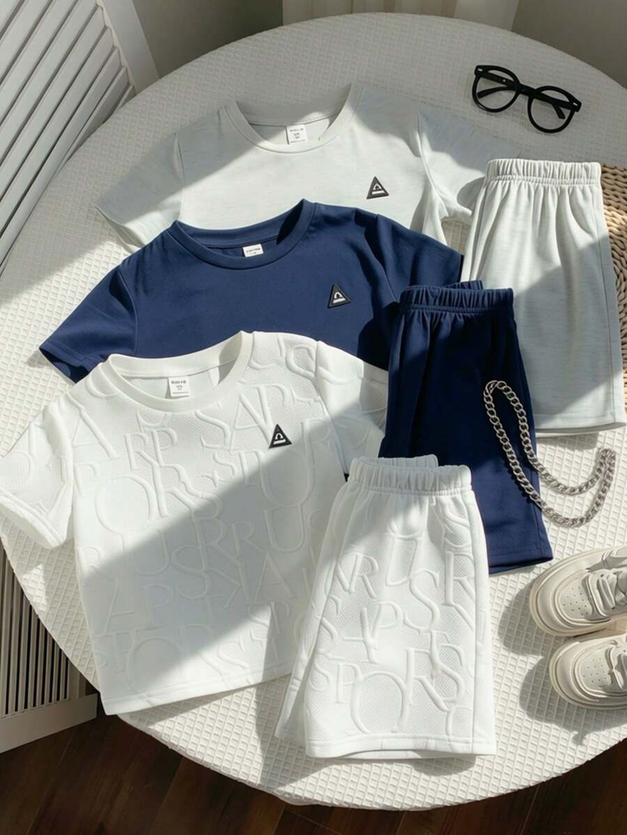 SHEIN 3件套儿童夏季服装，男童舒适休闲金属项链装饰圆领短袖T恤上衣和短裤两件套，高性价比套装，适合户外玩耍、街头摄影、派对、居家休闲等场合。 - 彩色 - 查看 1