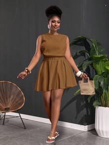 Slaydiva Bộ đồ mùa xuân/hè mới về, thích hợp cho kỳ nghỉ, đi làm, đi chơi và dự tiệc sang trọng. Áo crop top không tay ôm dáng và chân váy mini chữ A màu kaki trơn, chất liệu vải dệt họa tiết, thoải mái, cỡ lớn dành cho nữ, bộ 2 món, trang phục mùa hè. - Gỗ đỏ - Xem 4