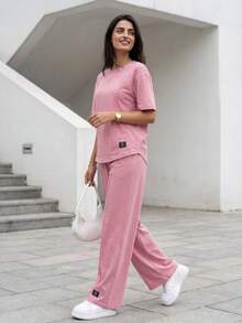 Solavon Bộ 2 món áo thun dài tay cổ tròn màu trơn và quần dài cho nữ, trang phục thường ngày, trang phục thường ngày, bộ đồ thể thao 2 món mặc ở nhà, thích hợp để đi bộ/thể thao/trở lại trường & trang phục thường ngày 2 món - Màu Hồng  Dưa hấu - Xem 4