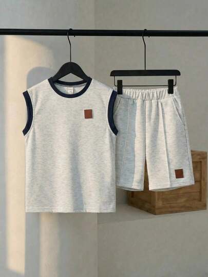 SHEIN 2pcs Kids Tween Boy Casual College Logo Crew Neck Short Sleeve T-Shirt And Gray Vest With Gray Sports Shorts T-Shirt Fabric Tracksuit Set, Suitable For Spring/Summer, Outings, Valentine's Day, Dates, Travel, Vacations, Family Gatherings, Back To School, Weddings, Evenings, Sports, Birthday Parties