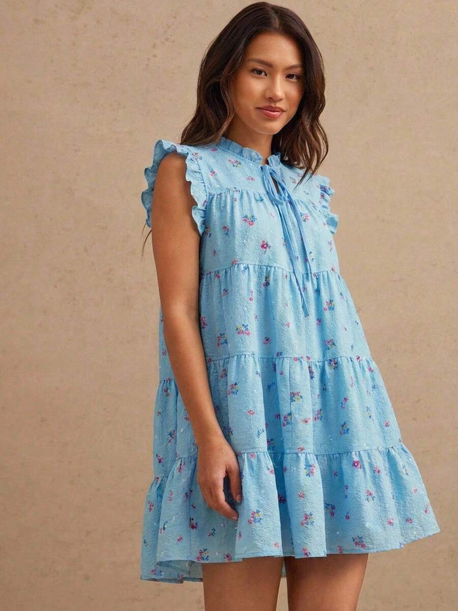 WESTFADE Ditsy Floral Printed Ruffle Mock Neck Bow Tie Lace Up Front Sleeveless Mini Dress Western Wear Women - Baby Blue - View 1