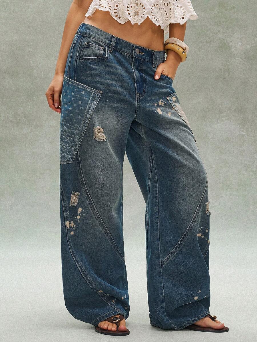 Bohemela Quần dài nữ phong cách Bohemian mùa hè giản dị và thoải mái, hoàn hảo cho thời trang đường phố, kỳ nghỉ và các lễ hội âm nhạc miền Tây. Thiết kế lấy cảm hứng từ phong cách Bohemian với chất liệu denim xanh cổ điển và hiệu ứng mài mòn retro, chiếc quần dài denim này được điểm xuyết bằng các mảng vải họa tiết Paisley. - Màu xanh lam - Xem 1