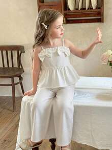 女童两件套夏季套装，可爱蝴蝶结吊带连衣裙+宽松阔腿裤，适合日常穿着、旅行、派对等场合。 - 白色 - 查看 3