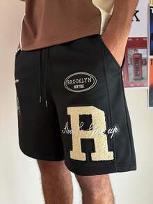 PAVTROS Men's Casual Letter Print Slant Pocket Loose Shorts - Black - View 6