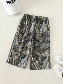 SHEIN Pantalones anchos de estampado de camuflaje y hojas de estilo casual de verano para niño - Multicolor - Ver 2