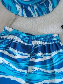 SHEIN Bộ đồ đi biển mùa hè 3 món cho bé trai | Áo ba lỗ trắng không tay + Quần short in hình cây cọ màu xanh dương "MÙA HÈ" + Mũ chống nắng cùng màu | Trang phục đi biển | Quần áo chơi nước | Trang phục ngoài trời cho bé 4-7 tuổi | Bộ quần short và mũ cho chuyến đi biển gia đình | Trang phục mùa hè mát mẻ - Nhiều màu - Xem 5
