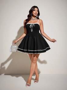 Viva Relle 大码女式新款黑白撞色喇叭连衣裙，撞色拼接设计，优雅百搭，适合春夏音乐节穿着，修身可调节肩带，腰部收紧，饰有蝴蝶结。 - 黑與白 - 查看 5