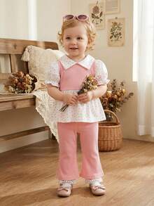SHEIN Playful Pals 2026春夏新款时尚假日女童两件套，采用优质面料制成，饰有俏皮的波点图案，荷叶边领泡泡袖上衣搭配喇叭裤，适合户外探险，让孩子们在阳光下自由奔跑；也适合休闲运动和优雅派对，让小公主在任何场合都成为众人瞩目的焦点。 - 粉色 - 查看 13