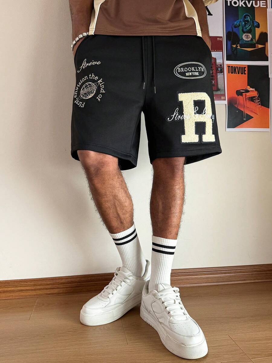 PAVTROS Men's Casual Letter Print Slant Pocket Loose Shorts - Black - View 1