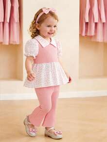 SHEIN Playful Pals 2026春夏新款时尚假日女童两件套，采用优质面料制成，饰有俏皮的波点图案，荷叶边领泡泡袖上衣搭配喇叭裤，适合户外探险，让孩子们在阳光下自由奔跑；也适合休闲运动和优雅派对，让小公主在任何场合都成为众人瞩目的焦点。 - 粉色 - 查看 10