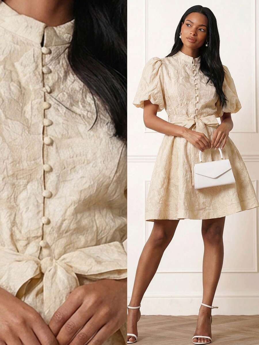 Lilora Đầm ngắn tay màu hồng trơn, cổ bẻ cài nút thắt nơ, vạt xòe, chất liệu jacquard, kiểu dáng thanh lịch, ngọt ngào, phù hợp cho các dịp thường nhật, hẹn hò, giao lưu nhẹ nhàng, dành cho nữ. - Màu be - Xem 1