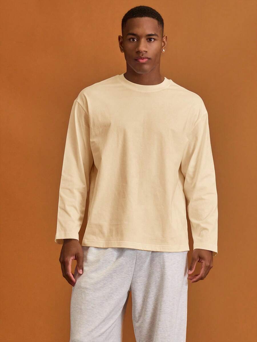 Musero Camiseta básica de manga larga y cuello redondo oversize para hombre, ideal para crear un armario cápsula y para capas en primavera y verano - Amarillo claro - Ver 1