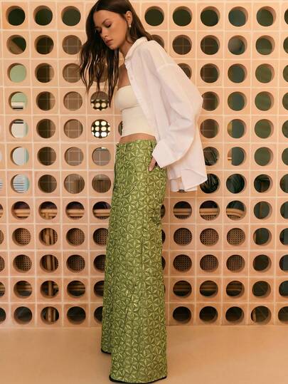 Nöista Wide-Leg Pants In Mauve With A 3d Geometric Quilted Texture. Designed With Rounded Patch Pockets And A Relaxed, Modern Fit. Spring Outfit , Spring Break Outfits, Spring Clothing, Casual Outfit, And Vacation Looks.