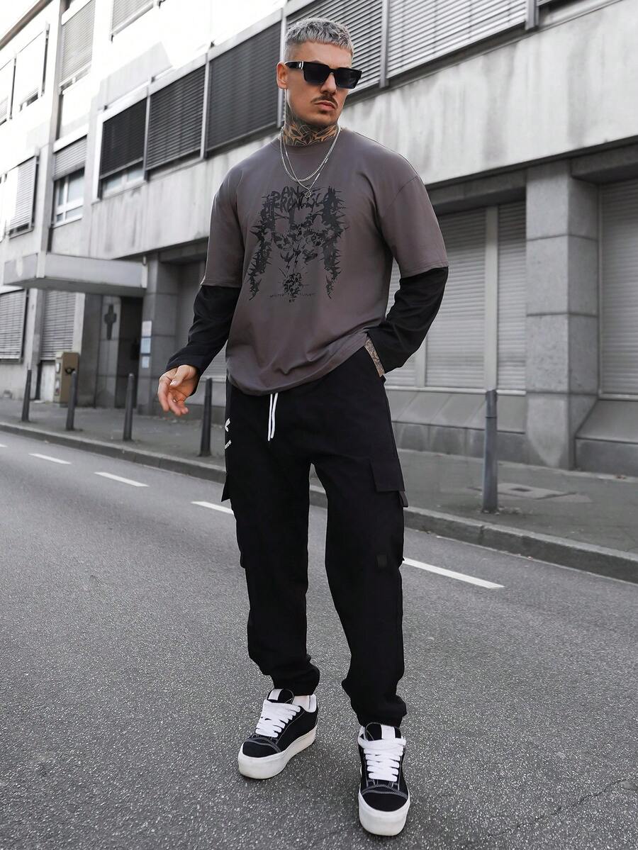 Artur Kramer Pantalones cargo holgados para hombres con estampado de expresión, bolsillo con solapa y cintura con cordón, otoño - Negro - Ver 1