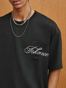 TOKVUE Camiseta casual de manga corta con cuello redondo, bordado de letras y estampado floral de jacquard de retazos para hombre - Negro - Ver 7