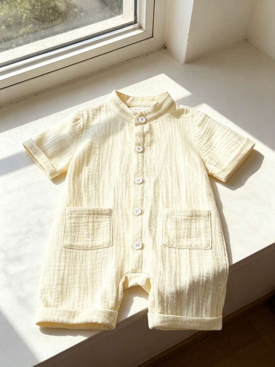 SHEIN 幼儿男童纽扣前袋贴片立领连体衣，适合日常休闲穿着、旅行、聚会、节日和上学，春夏季节（3个月-2岁） - 杏色 - 查看 1