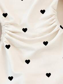 黑色爱心印花无袖连衣裙，适合少女穿着，春、夏、秋季皆宜，休闲外出、居家日常穿着皆可。舒适简约的经典修身爱心连衣裙，适合女孩和女性穿着。 - 彩色 - 查看 6