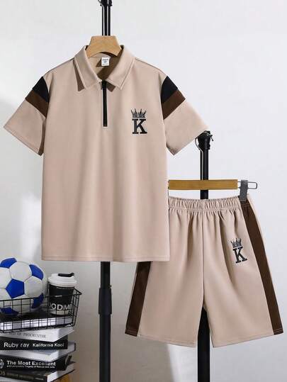 SHEIN Bộ 2 món áo polo và quần short phối màu phong cách thường ngày cho bé trai tuổi teen, thích hợp đi làm, đi học, mặc hàng ngày và chơi thể thao, bộ đồ hè cho bé trai, trang phục đi nghỉ mát cho bé trai.