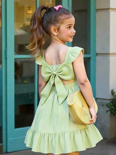 SHEIN Vestido casual de longitud media para niñas (talla pequeña) con diseño de lazo lindo en la espalda