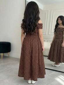 SHEIN Vintage Polka Dot Off-Shoulder Maxi Dress For Tween Girl, Smooth Fabric Design (Off-Shoulder Ruffle + Waist Pleats + Flared Skirt, Brown Base With White Polka Dot Print), Soft Material Suitable For Spring, Summer & Autumn, Classic Polka Dot Element + Elegant Off-Shoulder Silhouette Fit For Daily Wear, Birthday Party, Date, Fitted But Not Tight, Easy To Style, Creates A Retro Feminine Look - Brown - View 2