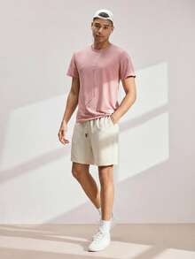 Driftmere Herren Loose Fit Shorts in Unifarbe mit schräger Tasche und Kordelzug Taille - Beige - Übersicht 8