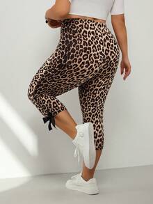 SHEIN CURVE+ 2 chiếc quần lửng cạp cao co giãn họa tiết da báo dành cho nữ cỡ lớn (có nơ trang trí) và quần lửng màu đen (có nơ trang trí) - Nhiều màu - Xem 2