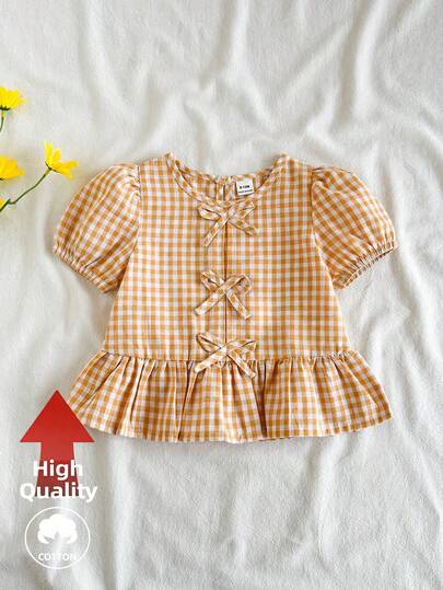 SHEIN Vintaside Kids 女婴衬衫，采用独特的印花面料，乡村度假风格，可爱时尚，适合春夏穿着，带有蝴蝶结装饰。