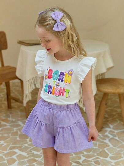 SHEIN 2件套女童圆领泡泡袖T恤+“Born Bright”彩虹标语+花卉装饰+抽绳叠层短裤，活力舒适，适合户外玩耍、日常穿着和休闲聚会的夏季套装。