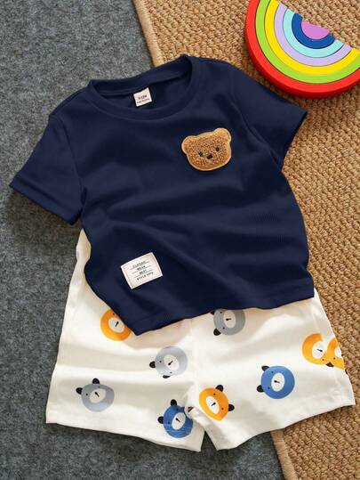 SHEIN Playful Pals 2 piezas Conjunto de ropa para bebé niño, Cárdigan de manga corta con cuello decorado con oso de dibujos animados y pantalones cortos estampados con osos, Conjunto de camisa y pantalones cortos para bebé niño, Conjunto de tela acanalada, Conjunto de ropa para bebé niño, Conjunto de oso de verano para bebé