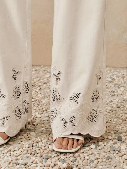Anewsta Jeans rectos de pierna casual con bolsillo sesgado y bordado floral blanco