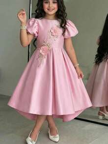 SHEIN Vestido elegante, dulce y lindo para niña preadolescente con decoración de flores 3D, cuello redondo, cintura ceñida, lazo grande en la espalda y mangas abullonadas, vestido de lujo para niñas, vestido rosa - Rosa - Ver 1