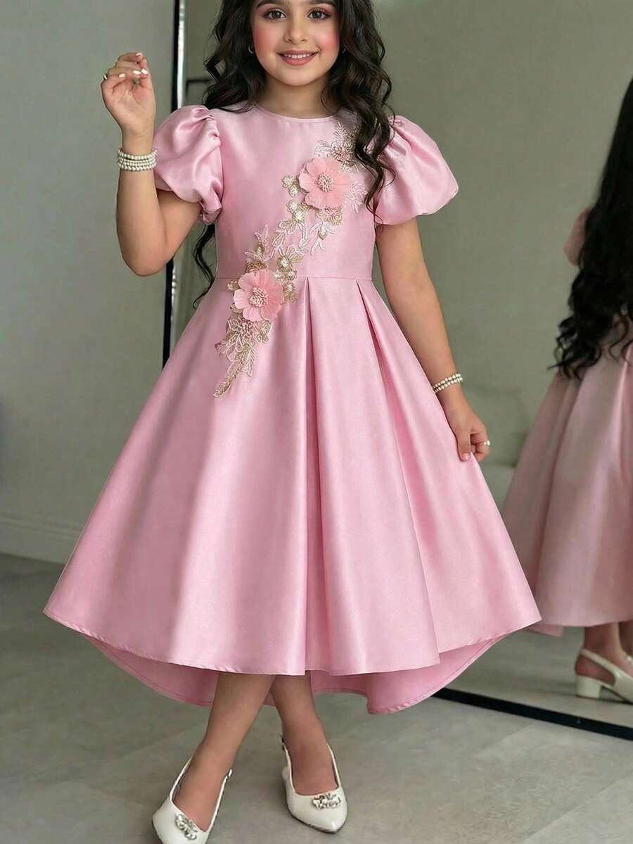 SHEIN Vestido elegante, dulce y lindo para niña preadolescente con decoración de flores 3D, cuello redondo, cintura ceñida, lazo grande en la espalda y mangas abullonadas, vestido de lujo para niñas, vestido rosa - Rosa - Ver 1