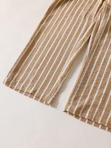 SHEIN Bộ trang phục lịch lãm 2 món cho thiếu niên nam, gồm áo khoác cardigan cổ tàu màu trắng và quần kaki sáng màu, bộ vest công sở thanh lịch, thích hợp mặc đi học, dự tiệc sinh nhật hoặc mặc thường ngày, phong cách tối giản. - trắng - Xem 5