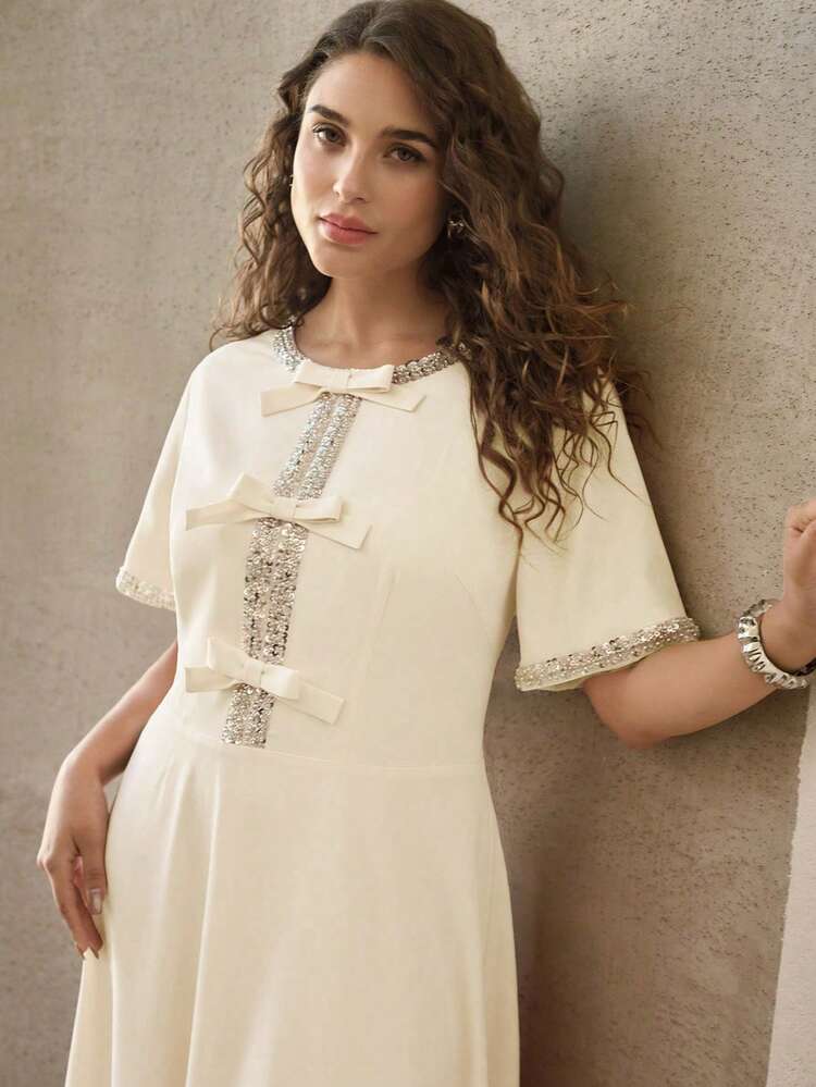 PLUS SIZE CONTRAST SEQUIN BOW DECOR CREW NECK SHORT SLEEVE DRESS