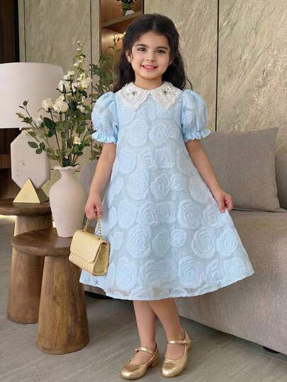 年轻女孩优雅花卉网纱连衣裙