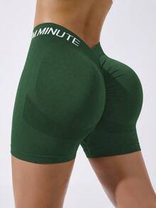 Dewbera Dewbera Pantalones cortos deportivos con estampado de letras y pliegues que realzan el trasero para mujeres - Verde militar - Ver 2