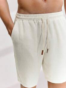 Driftmere Herren Loose Fit Shorts in Unifarbe mit schräger Tasche und Kordelzug Taille - Beige - Übersicht 4