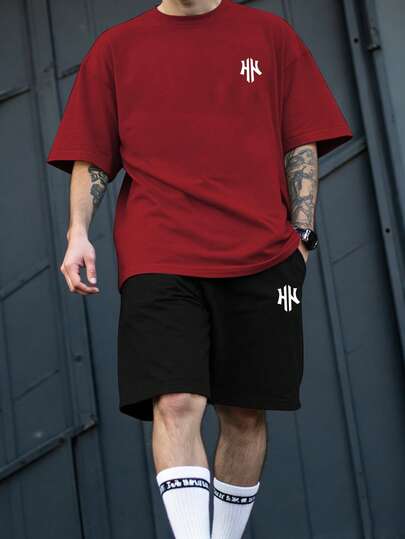 Manfinity Homme Conjunto de camiseta y pantalones cortos con estampado de letras para hombres de talla grande