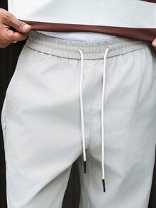 PAVTROS Pantalones largos casuales y versátiles para hombres con diseño de cordón y un solo hilera de botones - Beis - Ver 6
