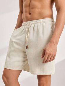 Driftmere Herren Loose Fit Shorts in Unifarbe mit schräger Tasche und Kordelzug Taille - Beige - Übersicht 7