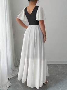 Vestido de gasa con volantes en las mangas, cuello en V y silueta evasé para mujer talla grande.Sencillo, elegante, romántico y con un fluir gracioso. - Blanco y Negro - Ver 2
